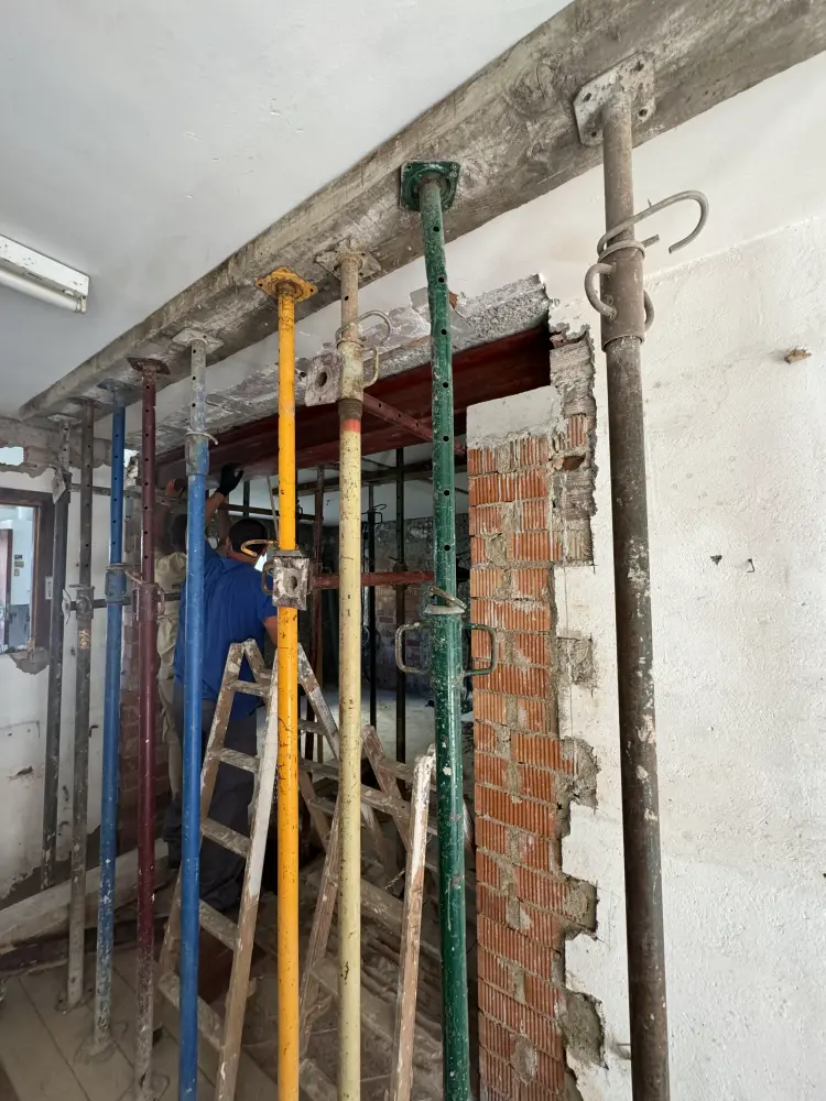 Steel beam installation and structural reinforcement